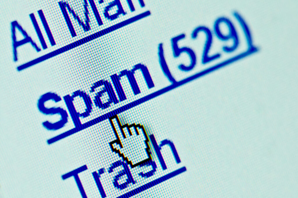 Close up of monitor with Spam folder with count of 529 blocking spam instead of deleting.