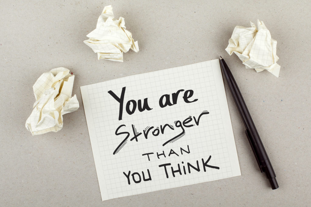 Paper that says "You are stronger than you think."