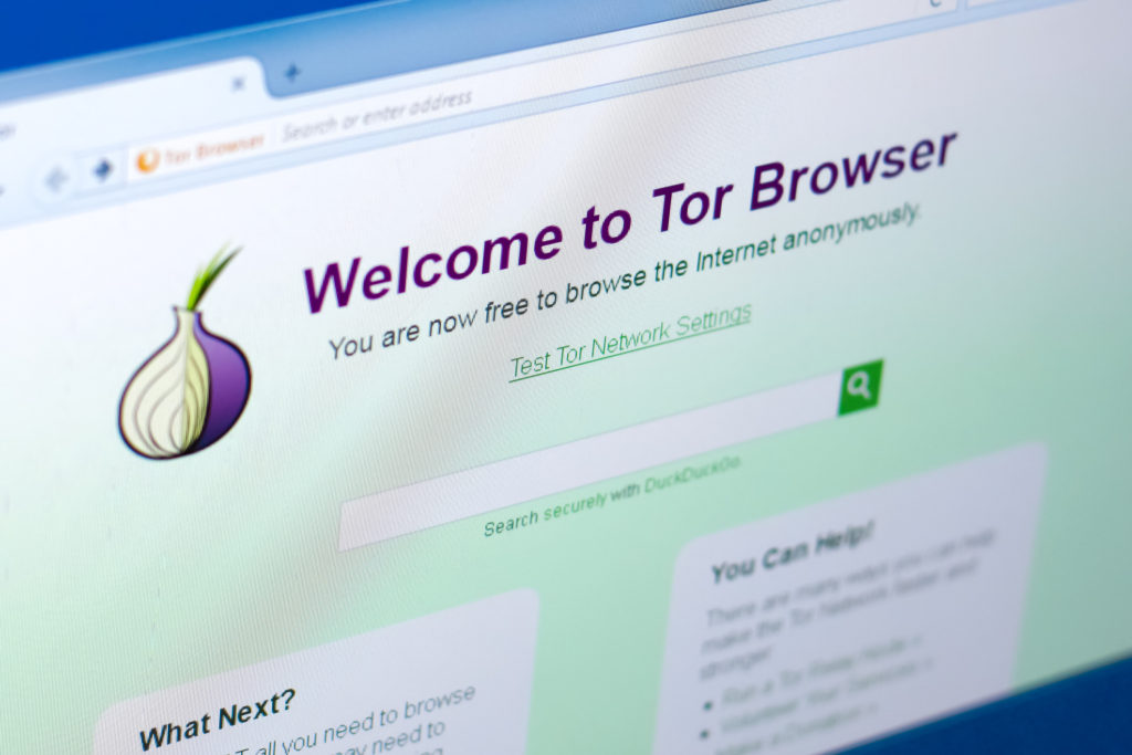 Tor browser on a display of PC with logo in a form of onion.