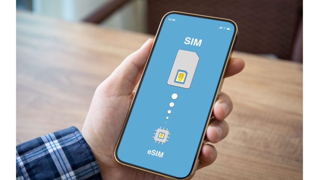 main holding phone close-up , activating his esim