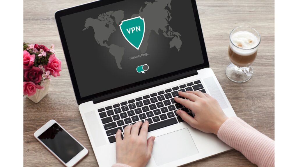 Woman turning on vpn on her laptop before she starts browsing