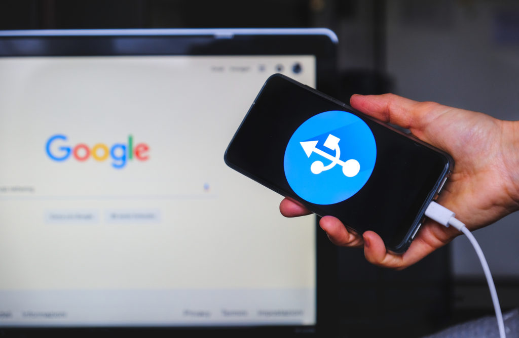 Cell phone USB tethered to a laptop.